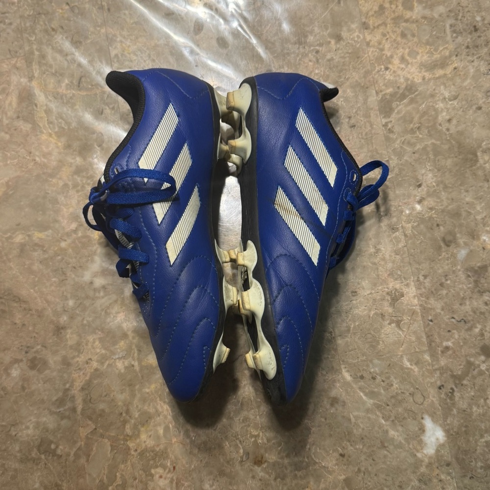 Blue/Ftwr White/Core Black" Soccer Cleats
Size 3.5
In great condition
Unisex - Picture 2 of 8